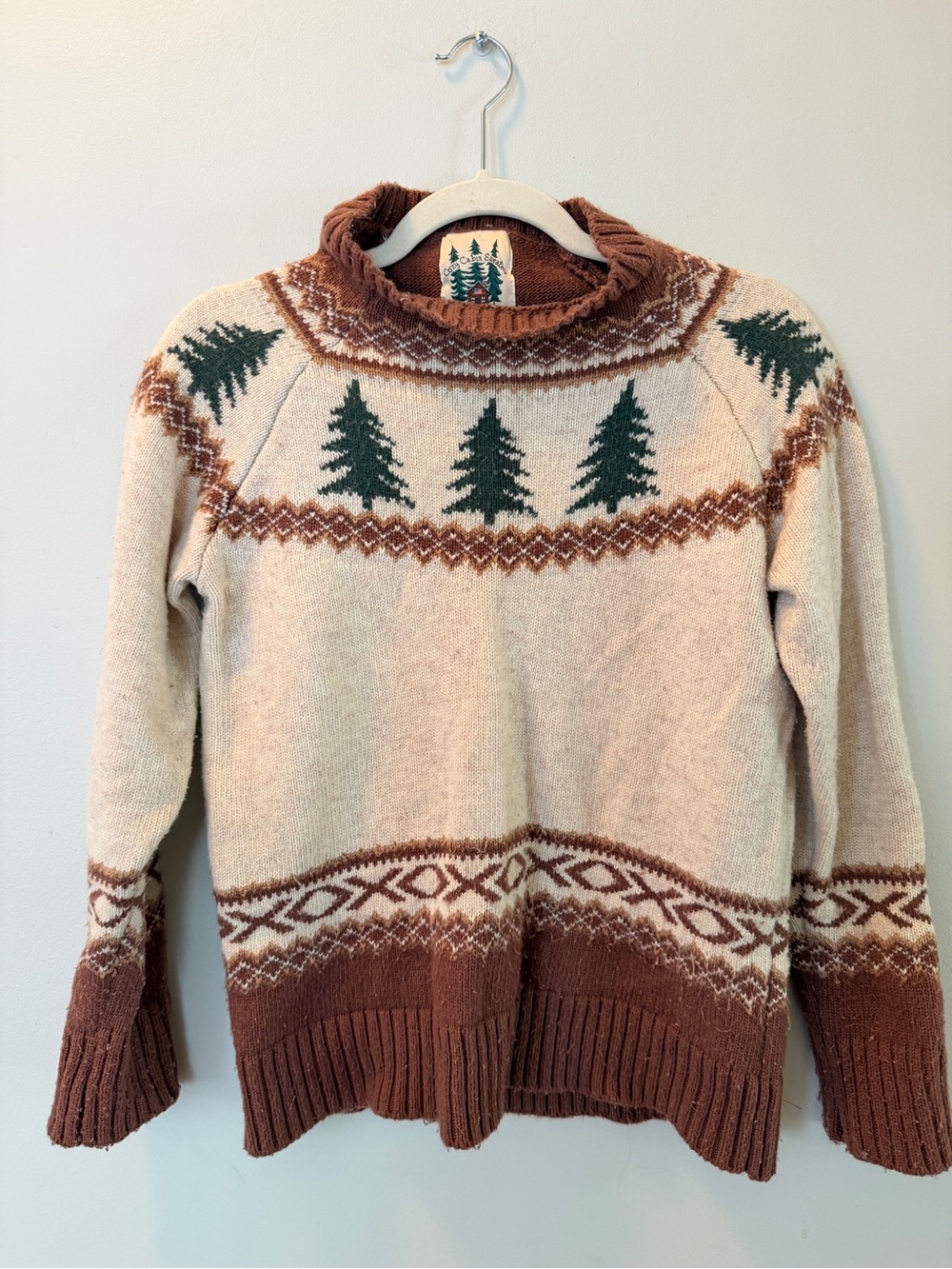Kiel James Patrick Cream Sweater with Brown Trim and Green Tree Motif